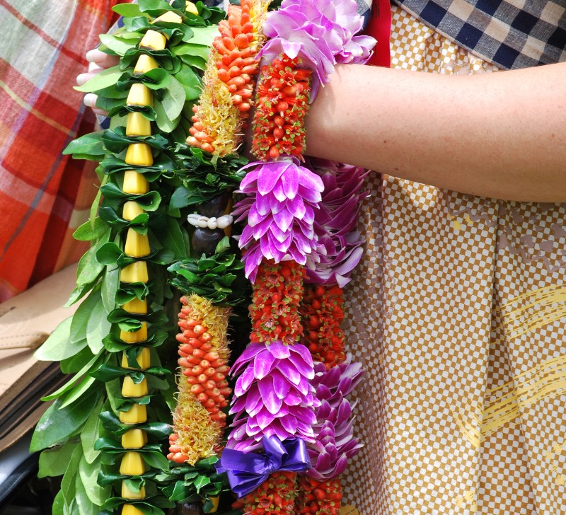 Lei hanging from woman's arm